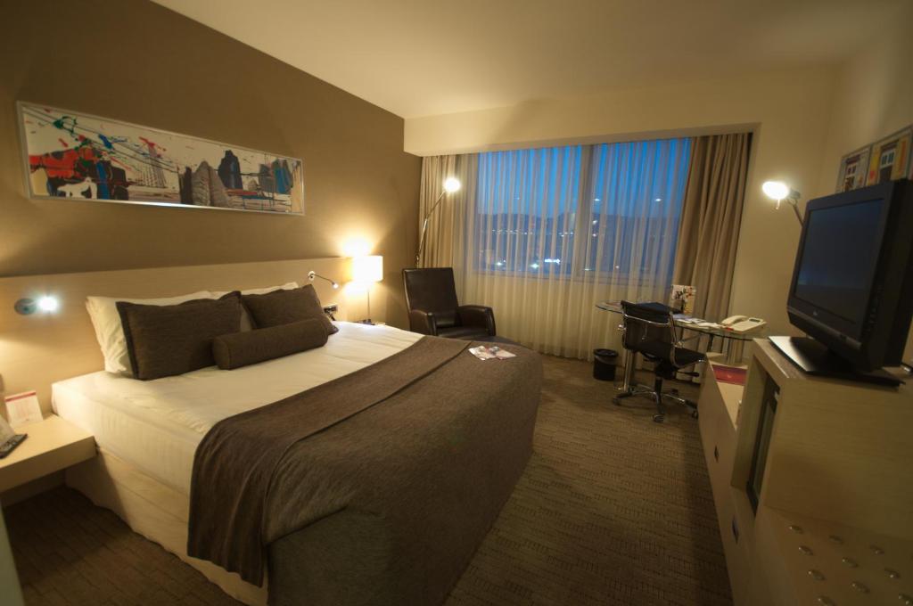 TV a/nebo společenská místnost v ubytování CPAnkara Hotel