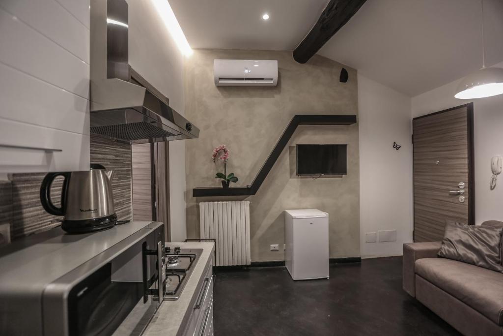 Kuchyňa alebo kuchynka v ubytovaní Stylish Apartment Near Duomo