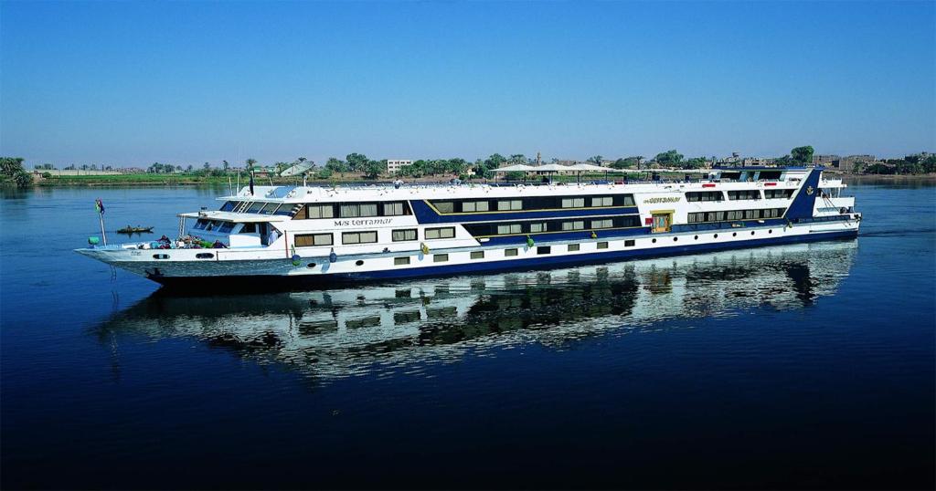 a large boat floating on the water at SUNRISE Terramar Cruise in Luxor