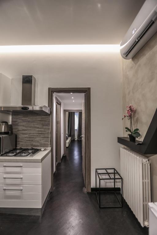Kuchyňa alebo kuchynka v ubytovaní Stylish Apartment Near Duomo