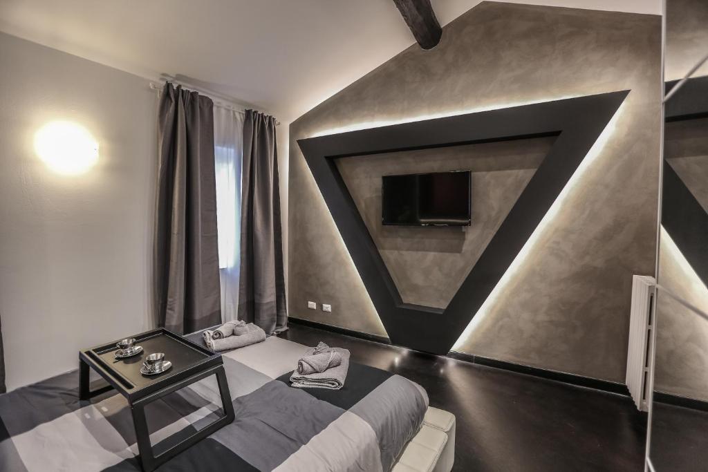 Posteľ alebo postele v izbe v ubytovaní Stylish Apartment Near Duomo