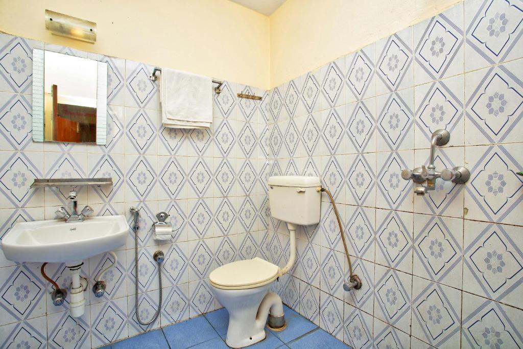 Koupelna v ubytování Hotel Grand Holiday