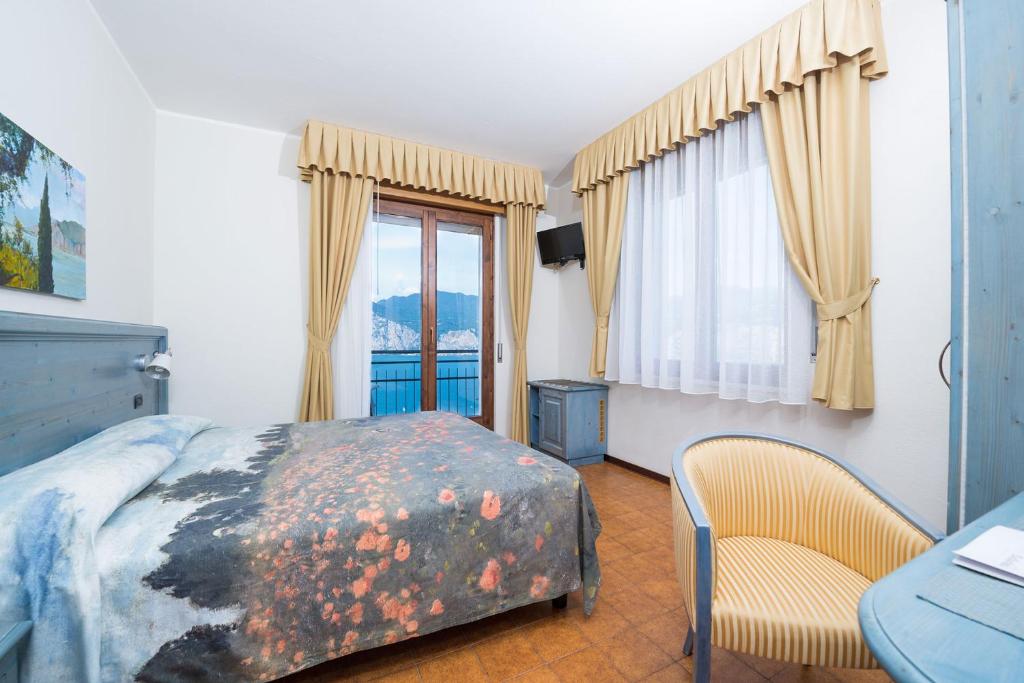 Postel nebo postele na pokoji v ubytování Hotel Bellavista