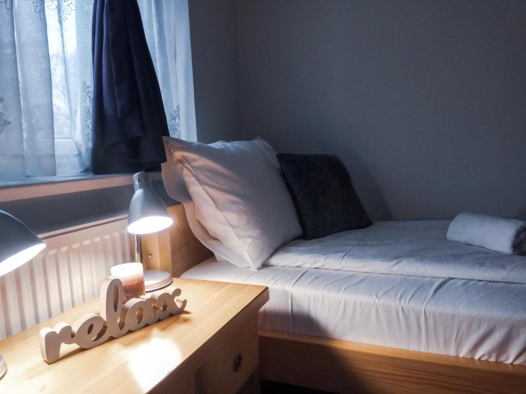 Postel nebo postele na pokoji v ubytování Bloom Inn