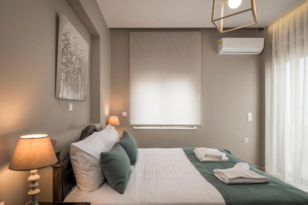 Postel nebo postele na pokoji v ubytování Mirma Luxury Apartment