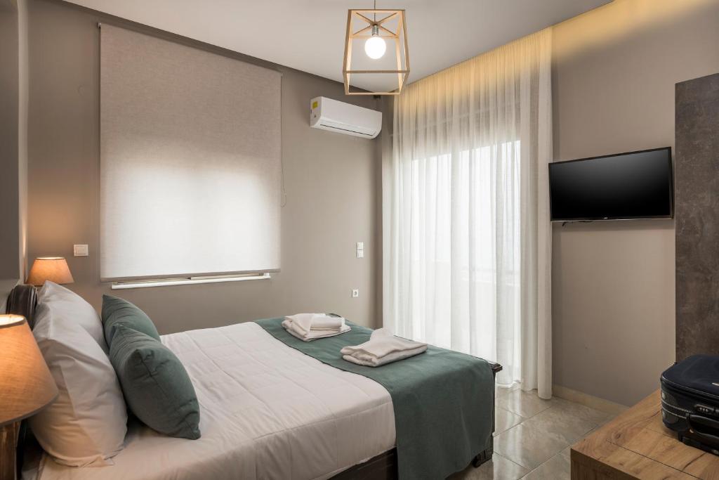 Postel nebo postele na pokoji v ubytování Mirma Luxury Apartment