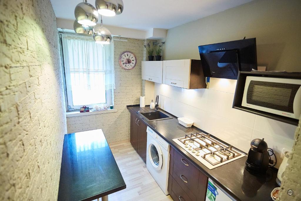 Kuchyňa alebo kuchynka v ubytovaní APARTAMENT IZABEL