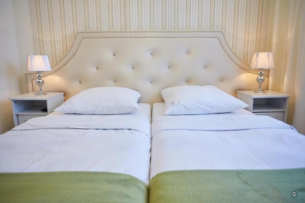 Ένα ή περισσότερα κρεβάτια σε δωμάτιο στο APARTAMENT IZABEL