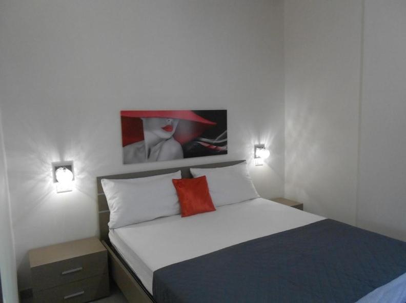 A bed or beds in a room at Residence Emarine