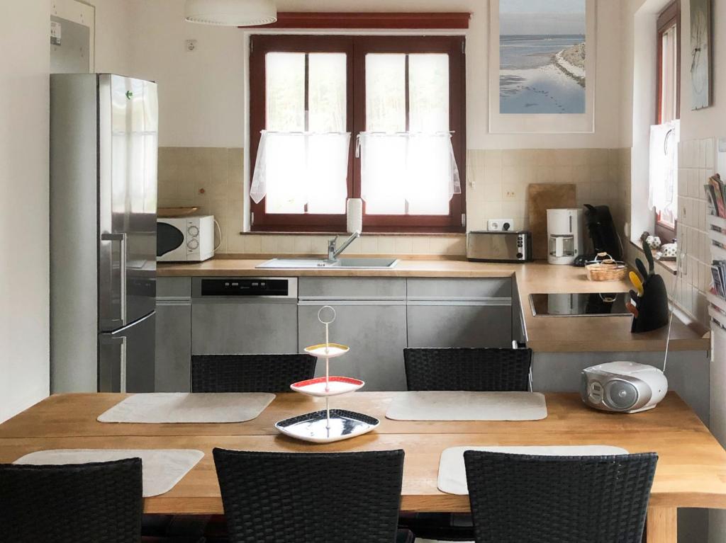 Kuchyň nebo kuchyňský kout v ubytování Haus am Meer