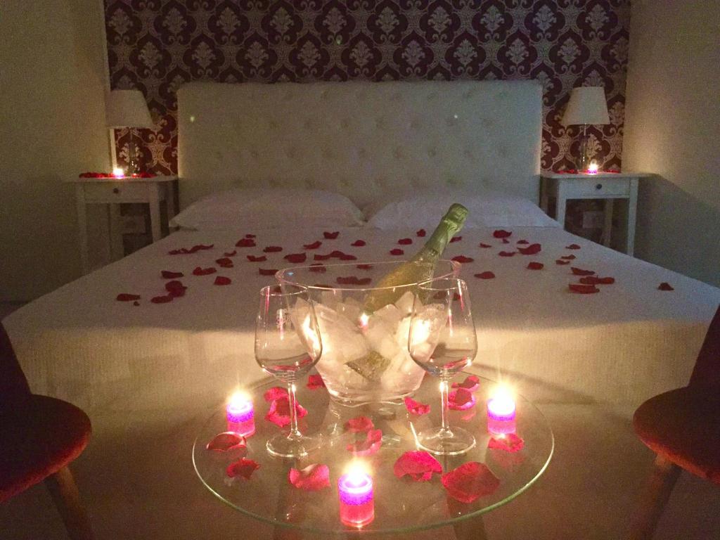 Postel nebo postele na pokoji v ubytování Dimora San Biagio Suites&Apartment