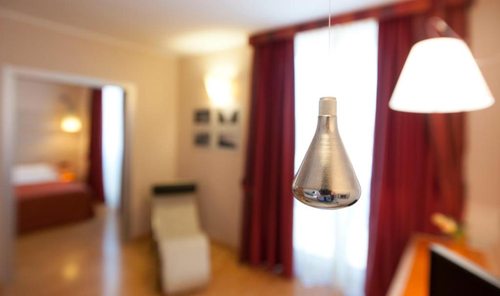Posteľ alebo postele v izbe v ubytovaní AlbaResidence Masera26