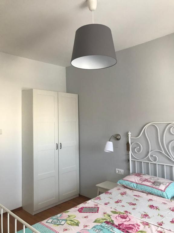 Posteľ alebo postele v izbe v ubytovaní Apartmani Maksan