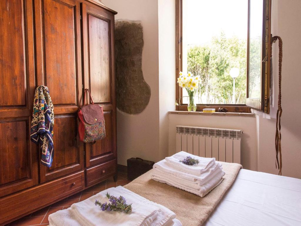 Postel nebo postele na pokoji v ubytování Country House il Ciliegio