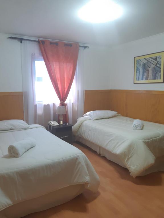 Postel nebo postele na pokoji v ubytování Agostini Hotel