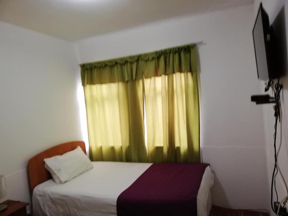Postel nebo postele na pokoji v ubytování Zigal hotel