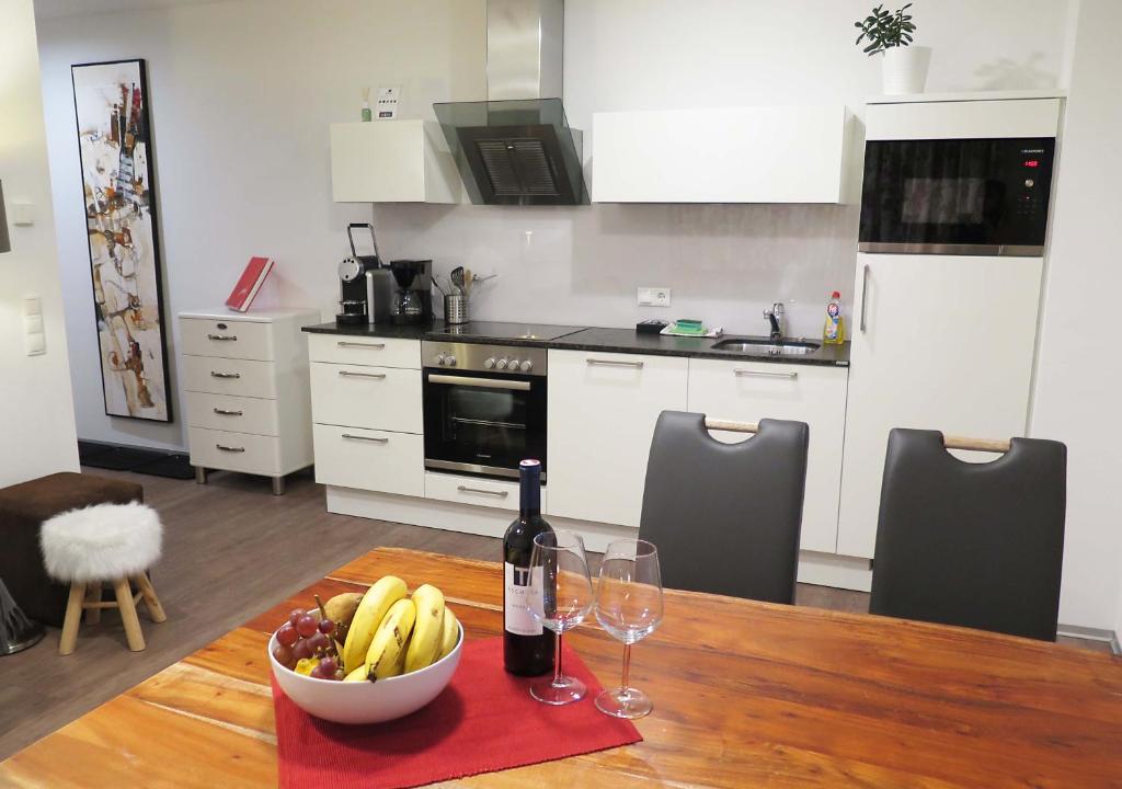 A kitchen or kitchenette at Art Apart Nomay Summercard Blick Top of Salzburg