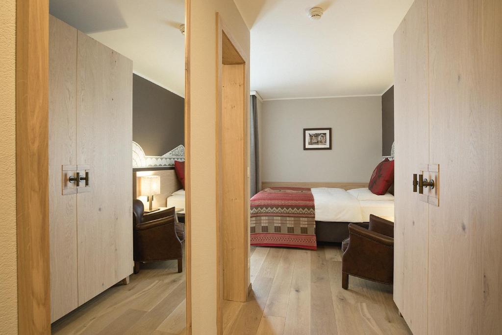 Postel nebo postele na pokoji v ubytování Hotel Steffani