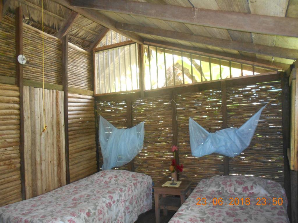 Una cama o camas en una habitación de Posada Villamaga