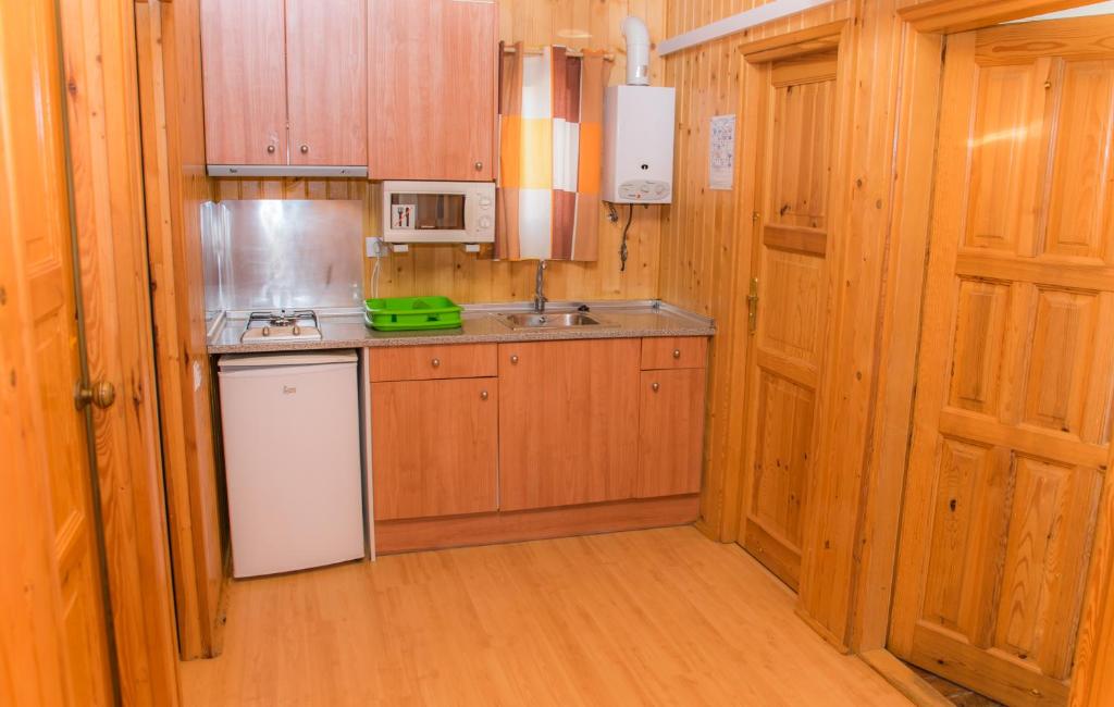 Kuchyň nebo kuchyňský kout v ubytování Camping Ametlla
