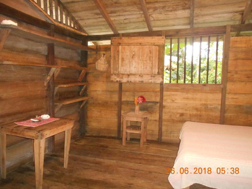 Una cama o camas en una habitación de Posada Villamaga