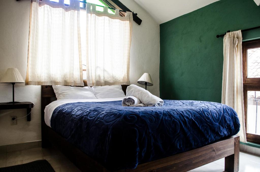 Postel nebo postele na pokoji v ubytování Casa Tequio
