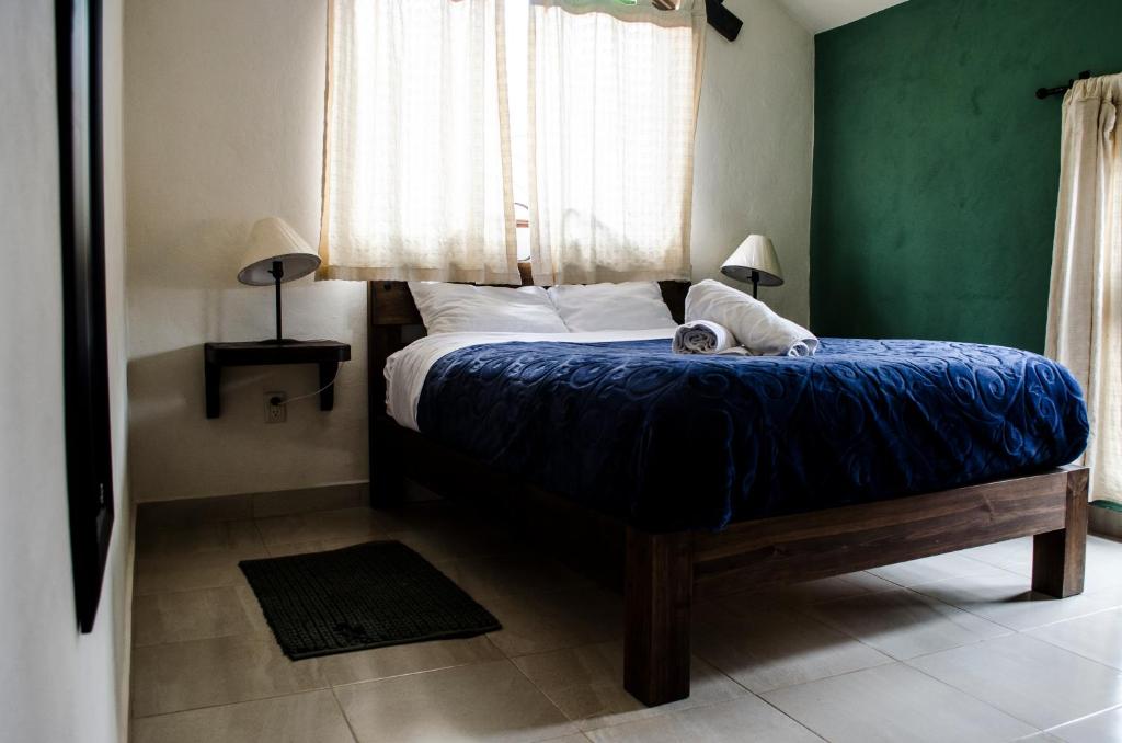 Postel nebo postele na pokoji v ubytování Casa Tequio