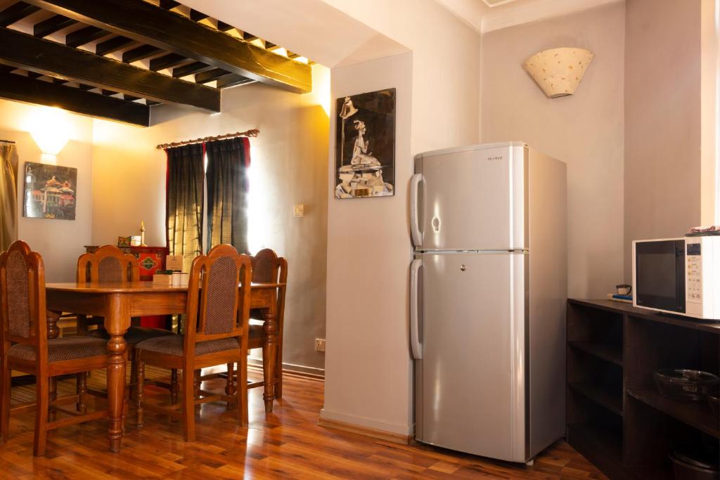 Kuchyň nebo kuchyňský kout v ubytování Shaligram Hotel & Spa