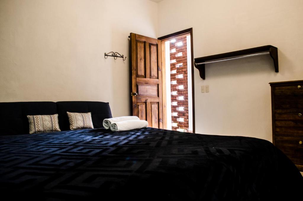 Postel nebo postele na pokoji v ubytování Casa Tequio