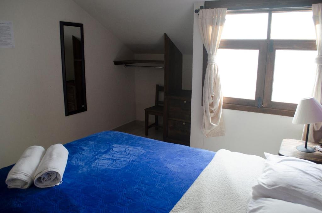 Postel nebo postele na pokoji v ubytování Casa Tequio