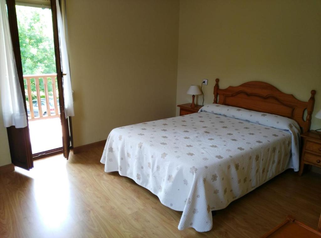 Postel nebo postele na pokoji v ubytování Camín de la reina