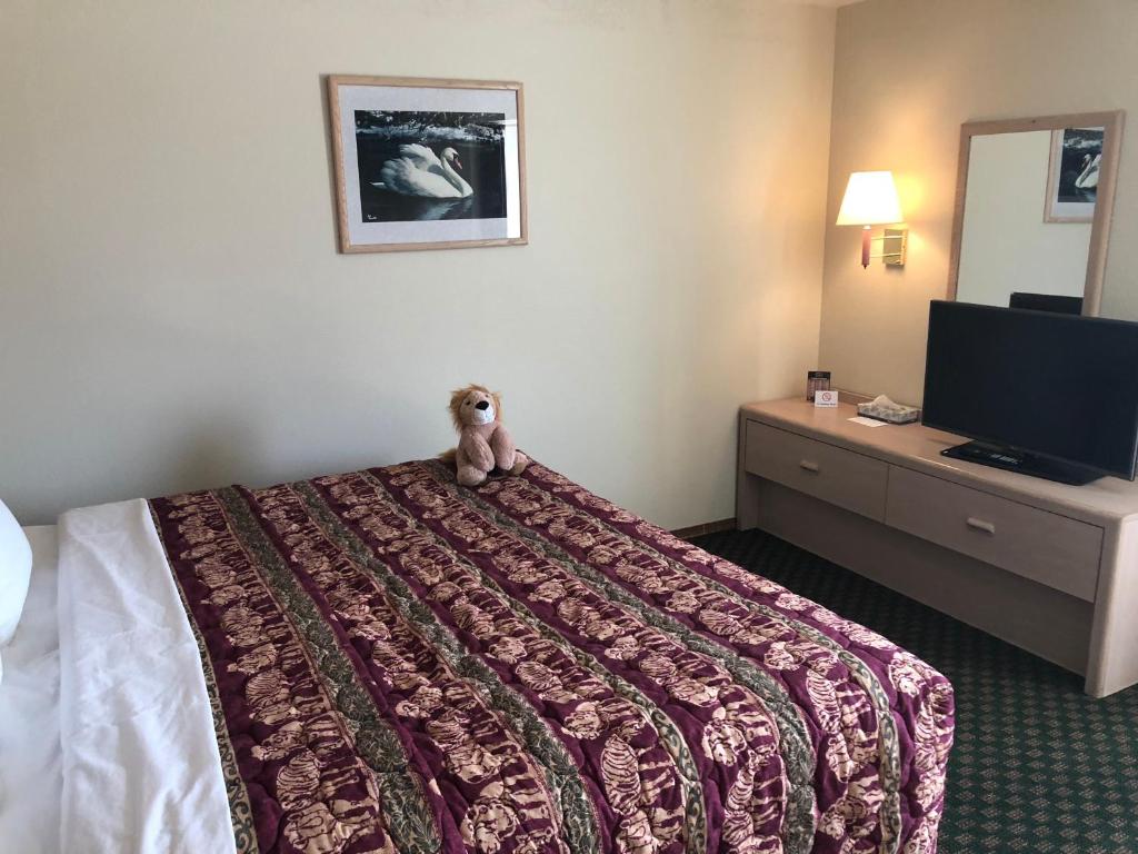 Postel nebo postele na pokoji v ubytování Kings Inn Cody