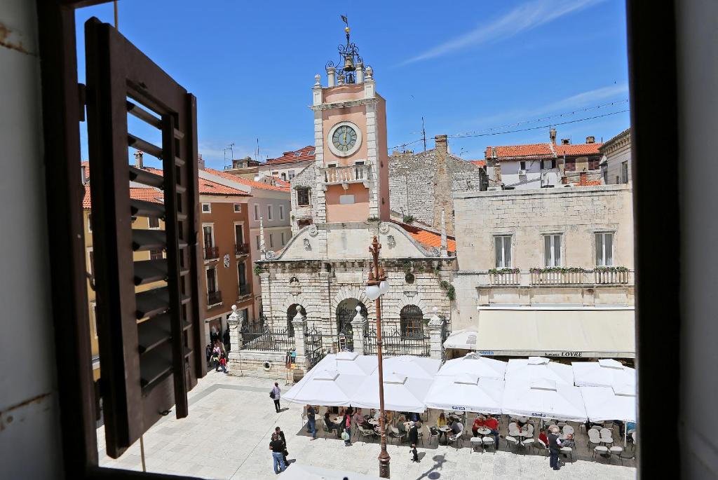 a view of a building with a clock tower at Rory Apartments in Zadar