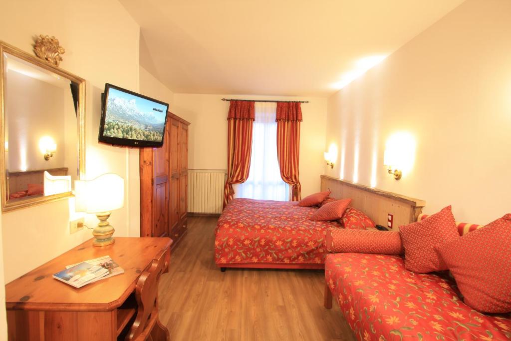 TV a/nebo společenská místnost v ubytování Hotel Trieste