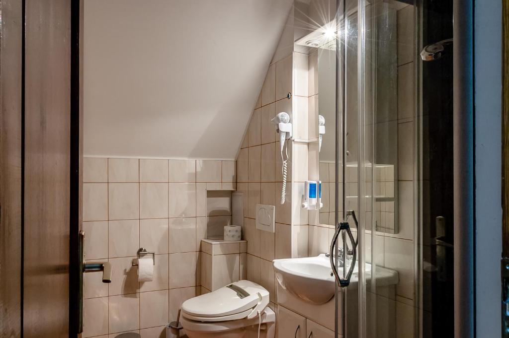 Kúpeľňa v ubytovaní Bástya Hotel