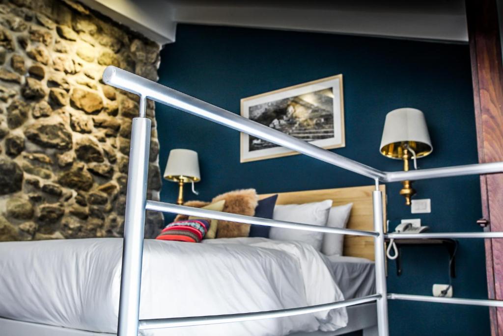 Letto o letti in una camera di Tariq Boutique