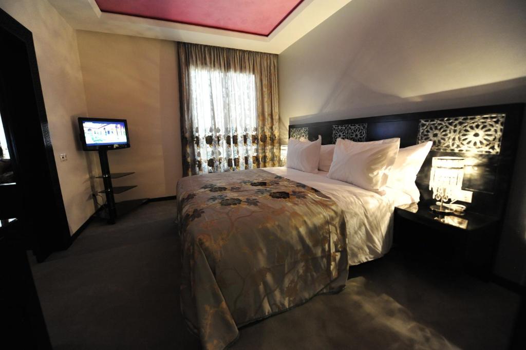 Postel nebo postele na pokoji v ubytování Rive Hotel