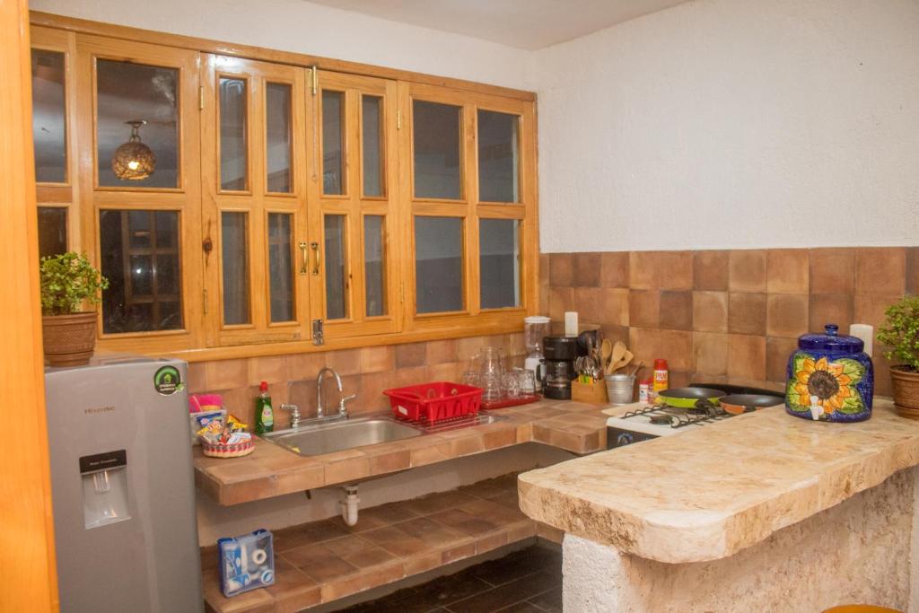 Kuchyň nebo kuchyňský kout v ubytování Aldea Isla Sagrada