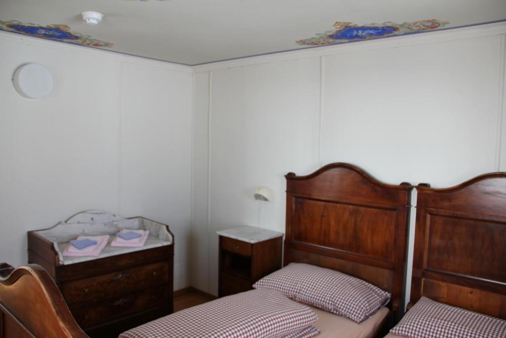 Een bed of bedden in een kamer bij Albergo San Gottardo