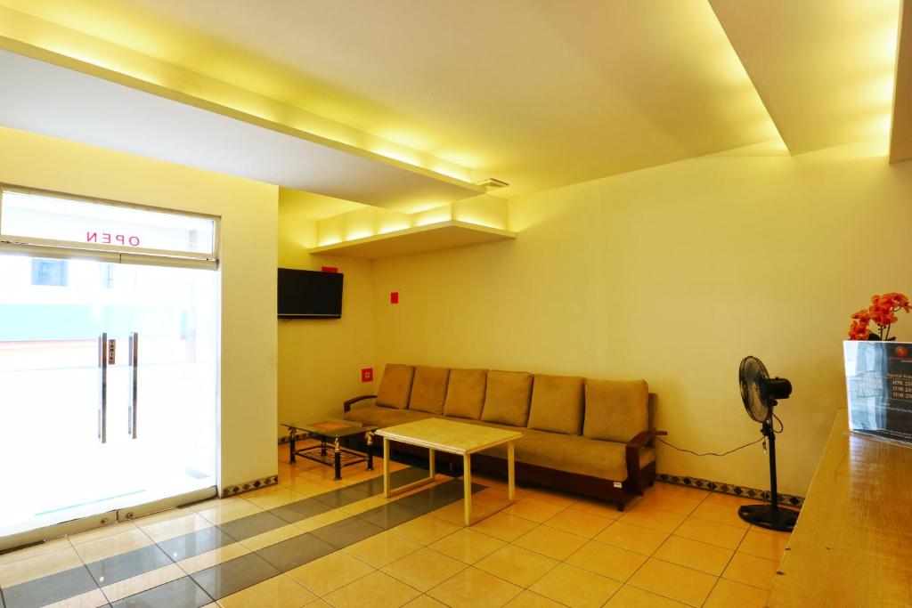 TV a/nebo společenská místnost v ubytování New Priok Indah Syariah Hotel