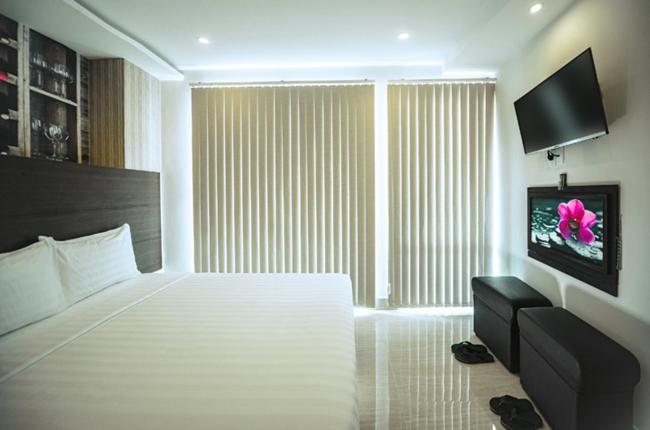 TV a/nebo společenská místnost v ubytování Duy Ninh Hotel