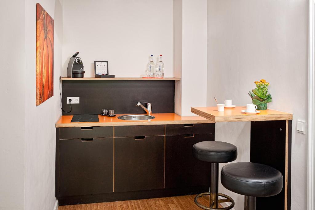 Kuchyň nebo kuchyňský kout v ubytování Das Gästehaus der Elb Lounge "Self Check In"