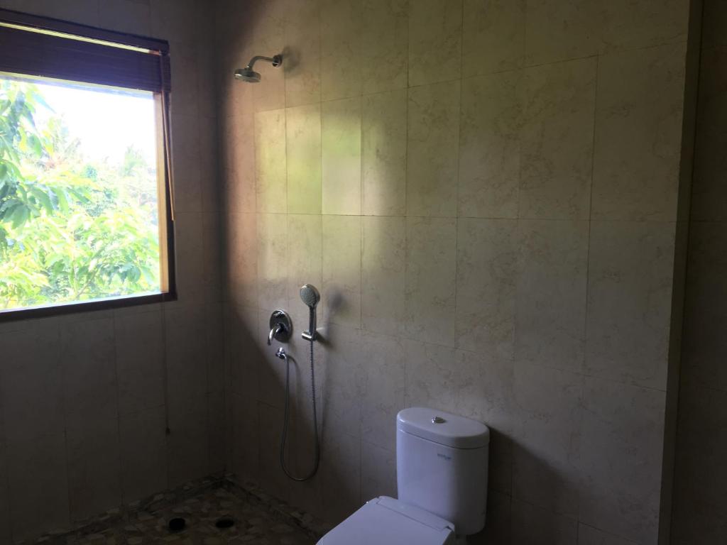 Koupelna v ubytování Raka Rai Bungalows