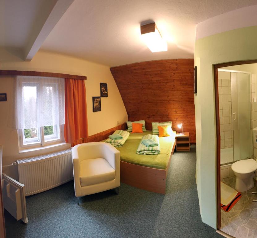 Postel nebo postele na pokoji v ubytování Hotel Zátiší