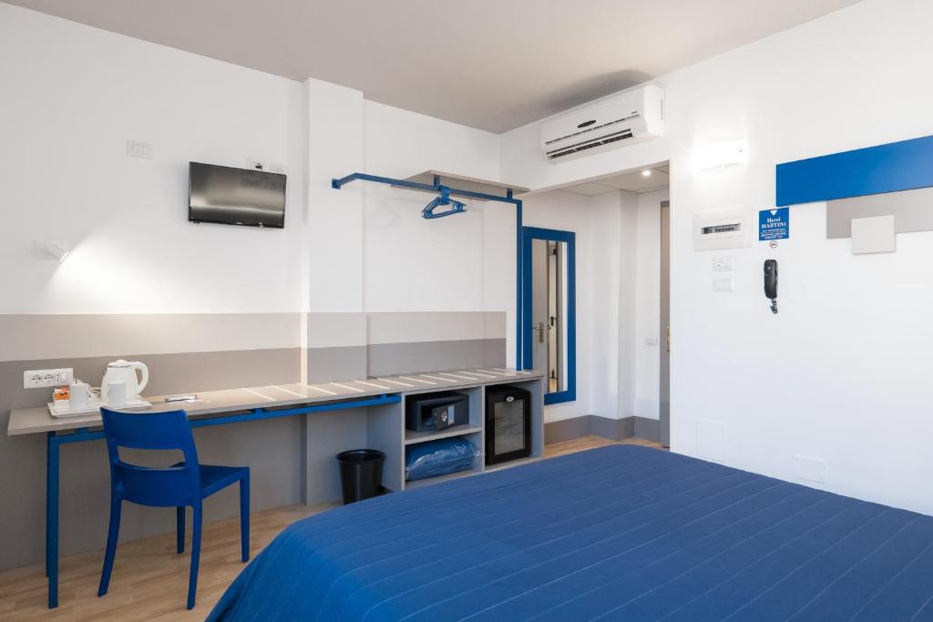 Kuchyň nebo kuchyňský kout v ubytování Hotel Martini
