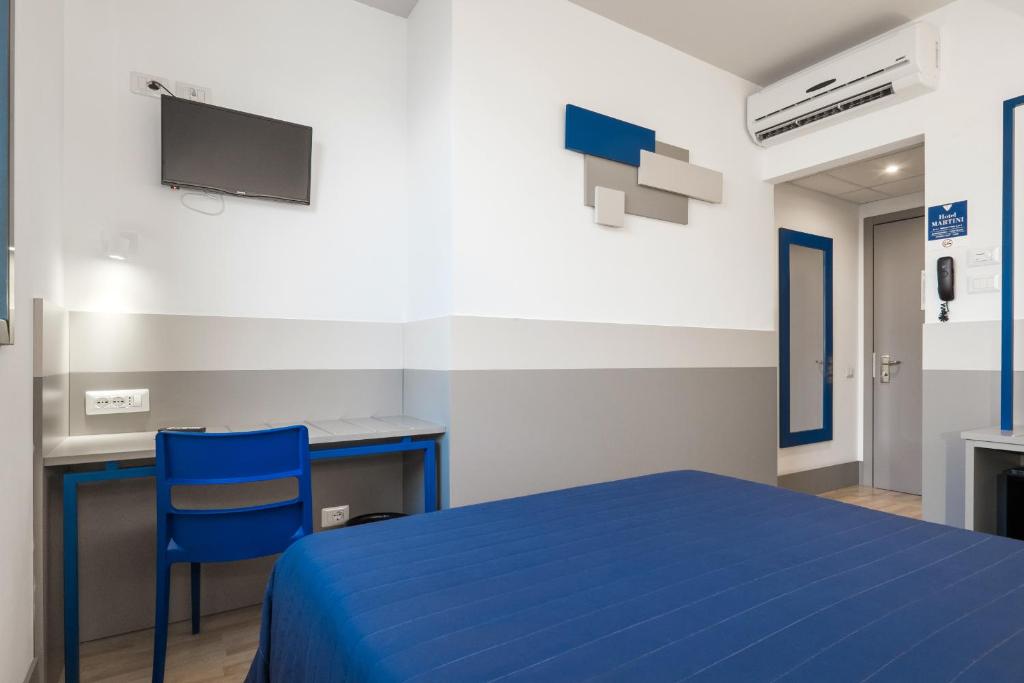 TV a/nebo společenská místnost v ubytování Hotel Martini