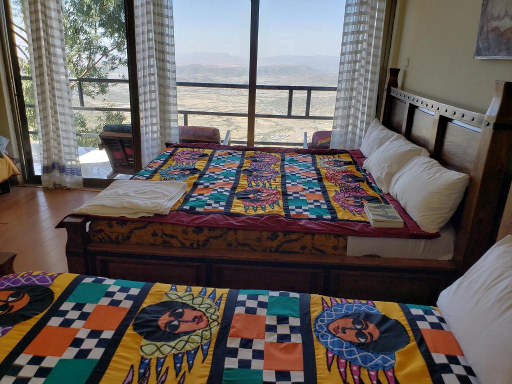 Postel nebo postele na pokoji v ubytování Top Twelve Hotel - Lalibela