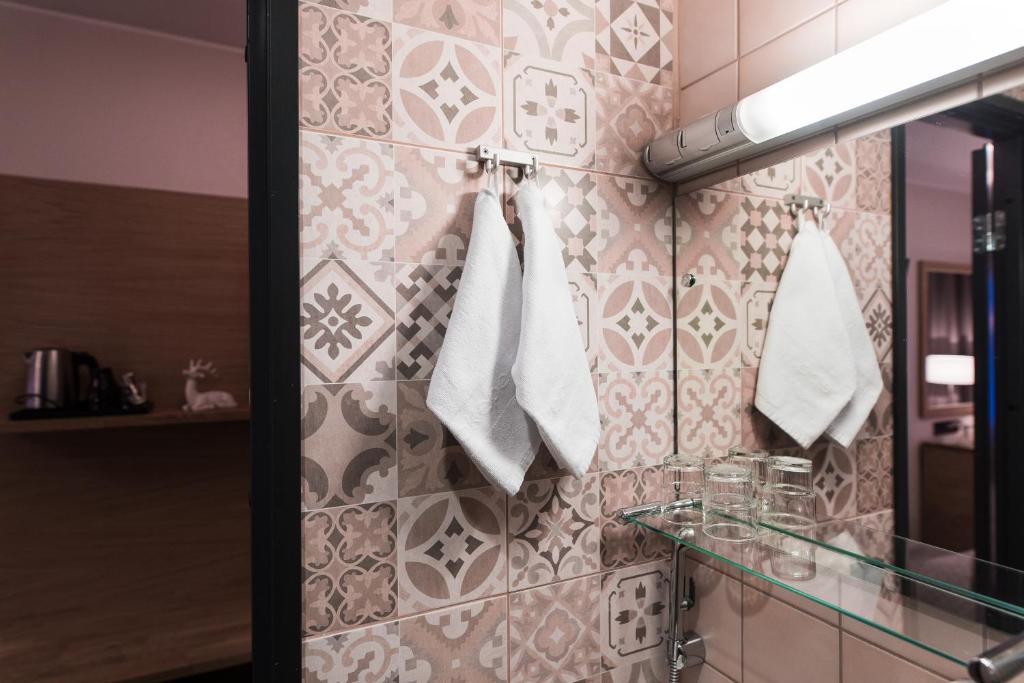 Koupelna v ubytování Hotel Aakenus