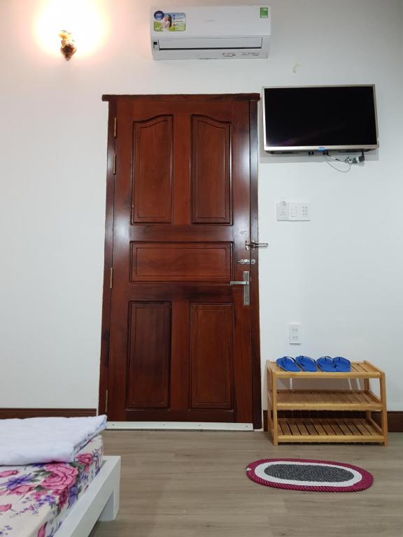 TV a/nebo společenská místnost v ubytování Minh Kim Guesthouse