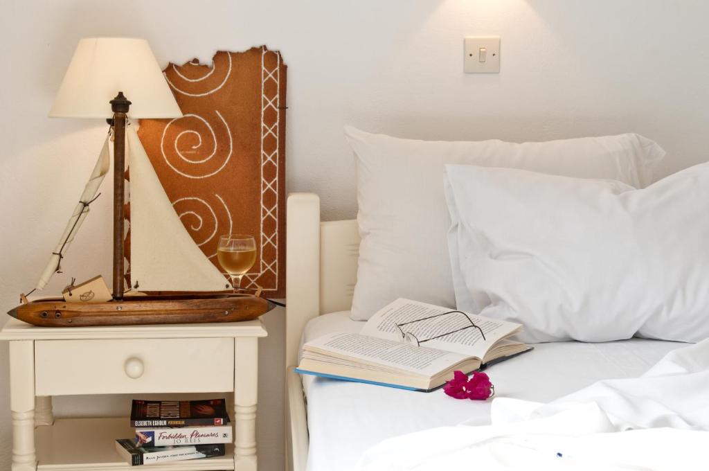 Een bed of bedden in een kamer bij Hotel Matina